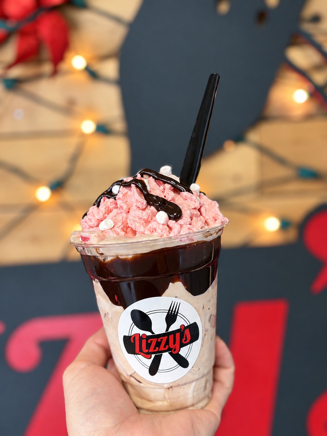Cocoa swirl Twister in a branded takeaway cup